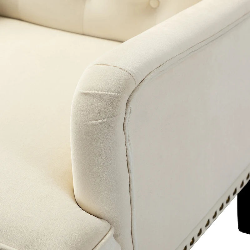 Fauteuil club capitonné de style transitoire